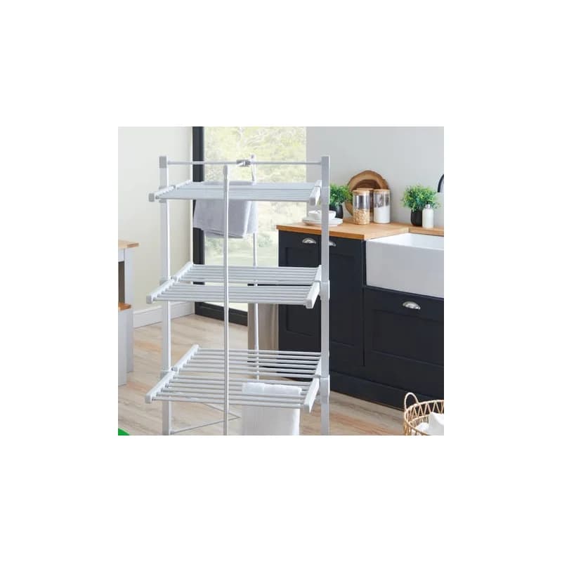 Dunelm white three-tier heated airer with towels in a kitchen